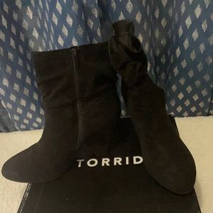 Black booties with a heel & side zipper